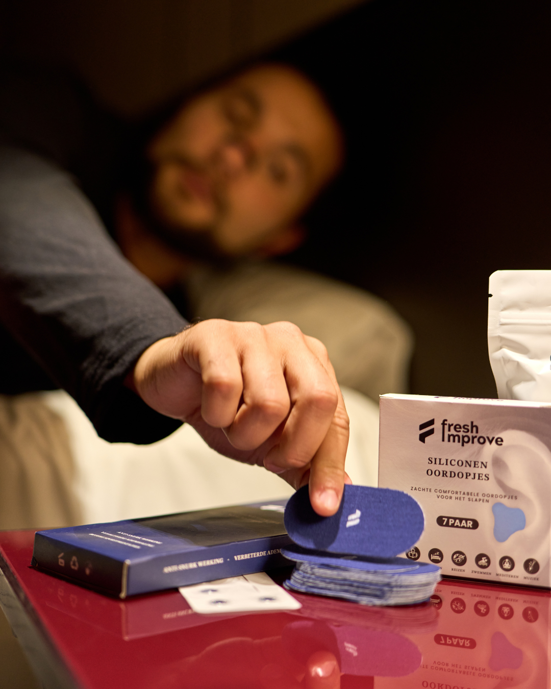 Man using FreshImprove XL bundle for better sleep and breathing.